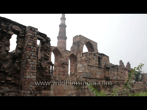 Qutub Minar as seen through arch from tomb of Iltutmish