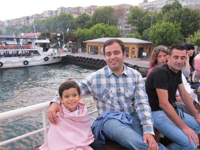 Adi and Sachin on boat