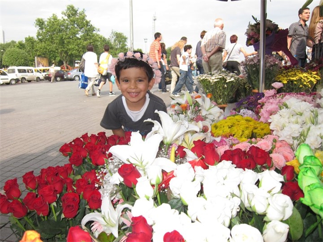 Adi smelling flowers2