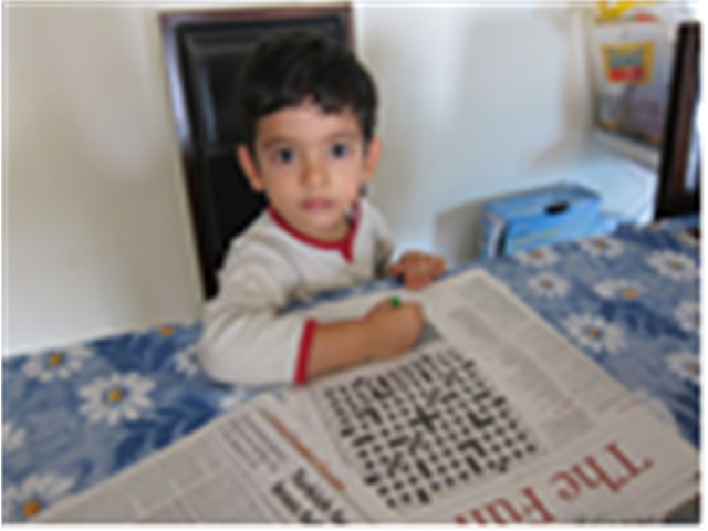 Adi playing crossword